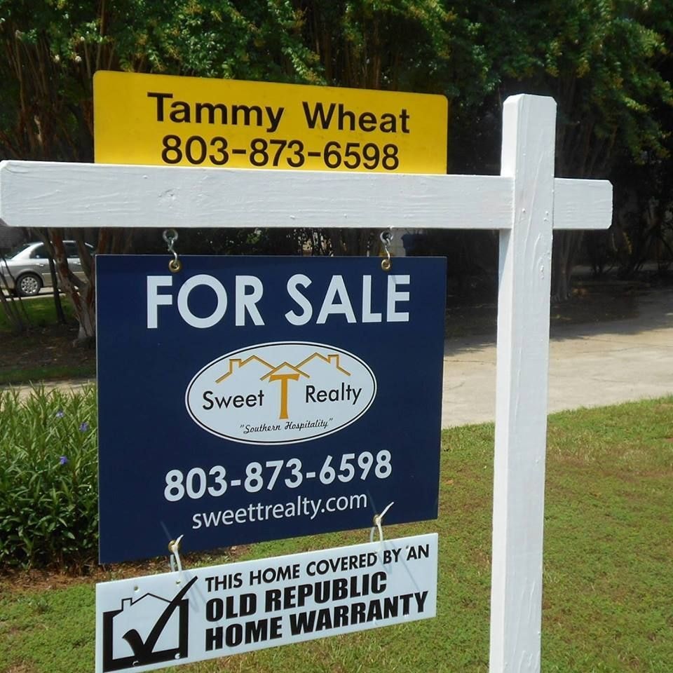 Sweet T Realty For Sale sign